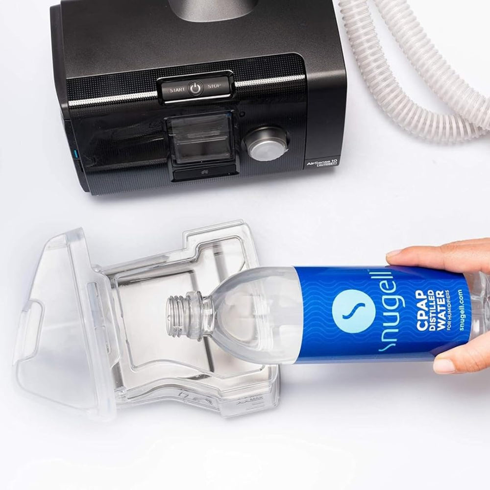 Snugell distilled water shown for multiple uses like humidifiers and steamers.