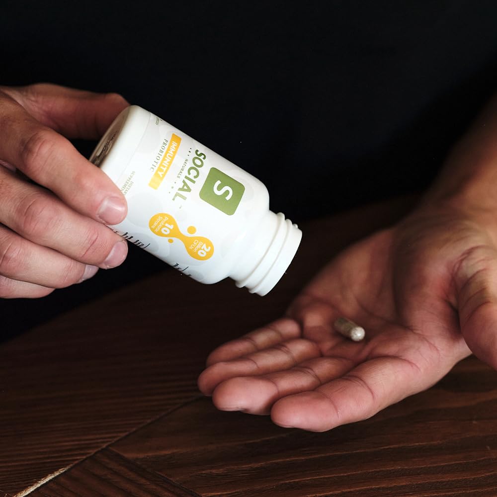 Social Naturals Immunity Probiotic packaging with quality testing certificates.