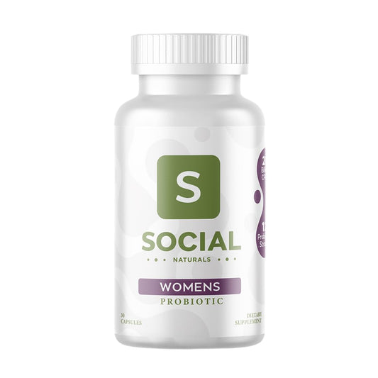 Social Naturals Women's Probiotic bottle on the kitchen counter for daily digestive support