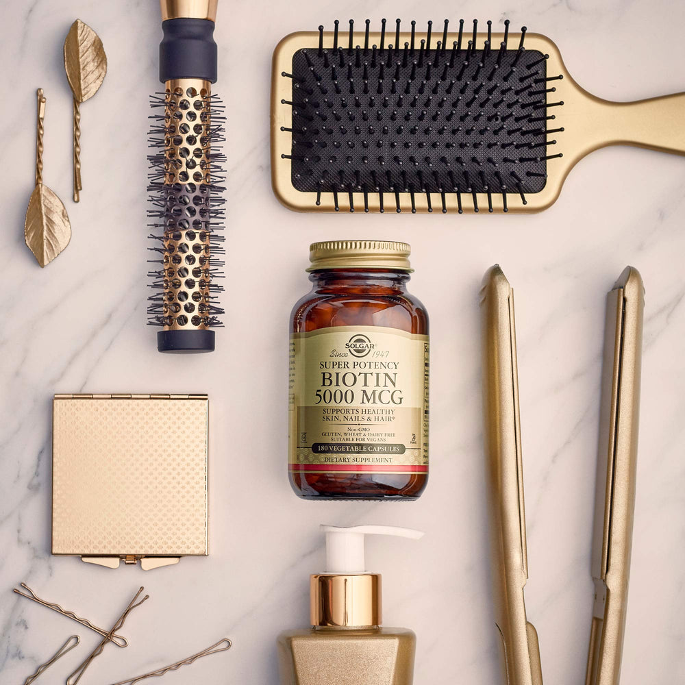Solgar Biotin 5000 mcg vegan, non-GMO packaging claim.