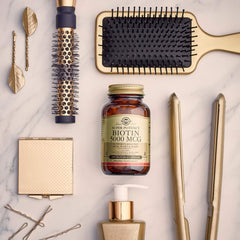 Solgar Biotin 5000 mcg vegan, non-GMO packaging claim.