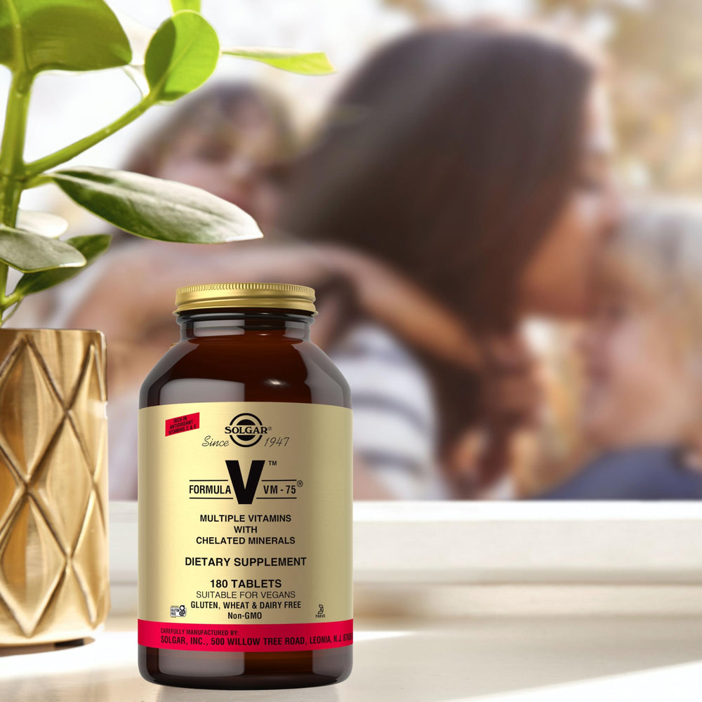 Solgar Formula VM-75 bottle shown in a daily wellness routine.