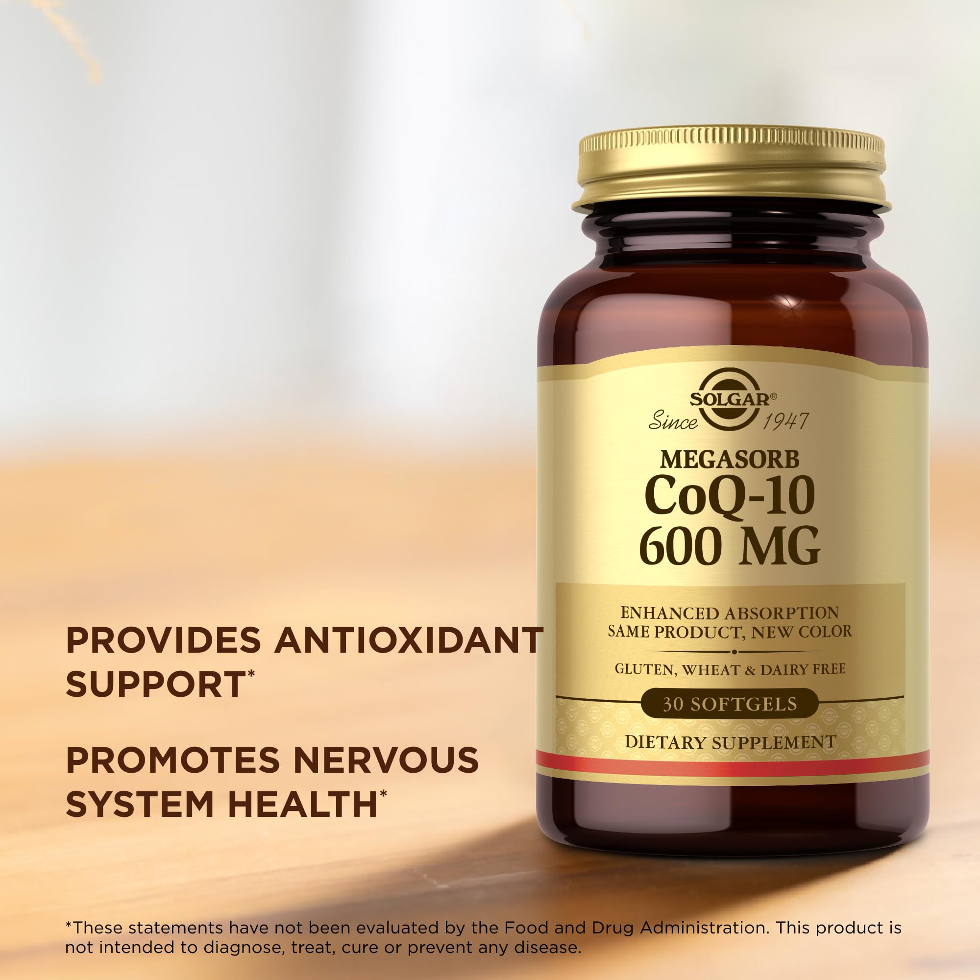 Solgar Megasorb CoQ-10 softgels poured illustrating oil-based absorption