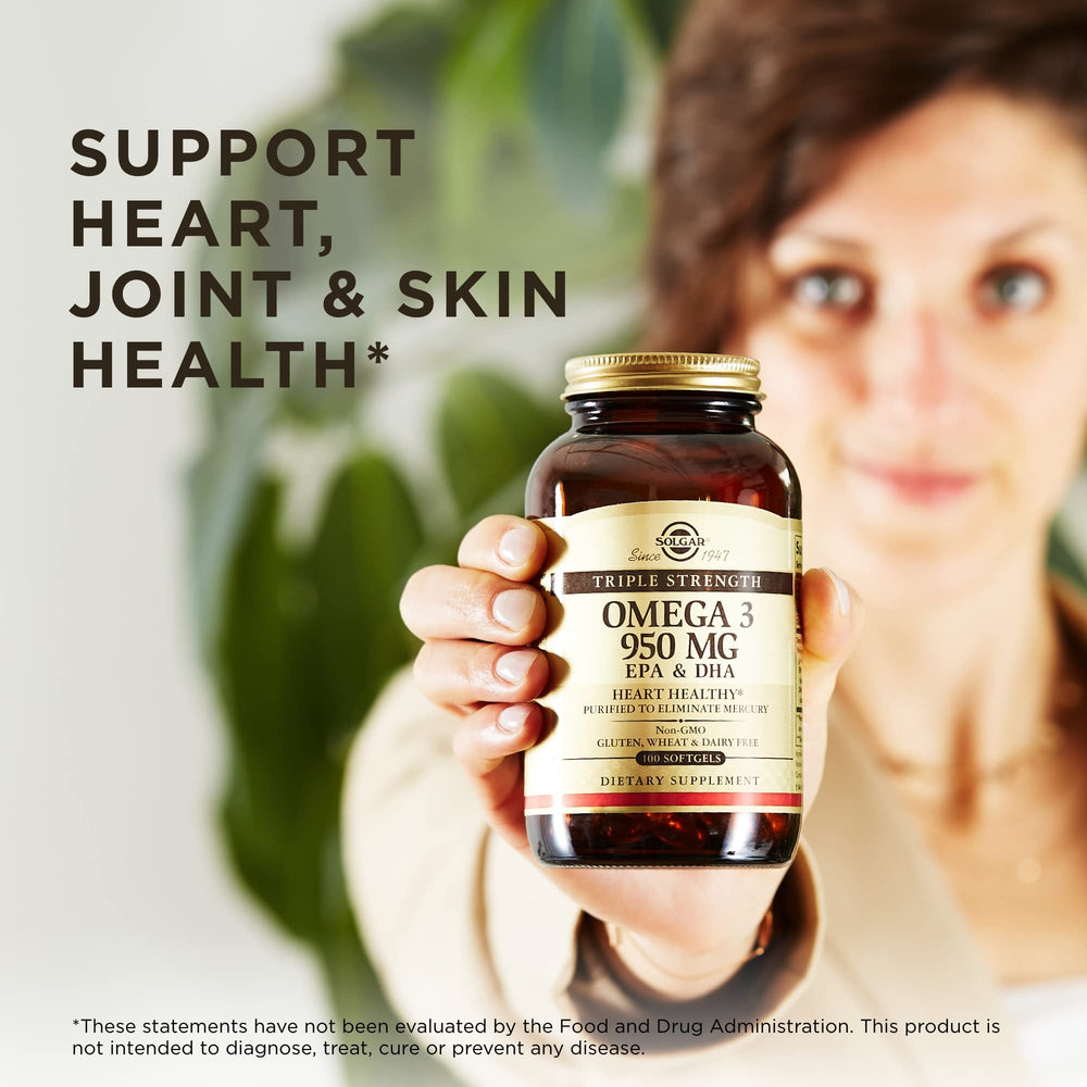 Solgar Omega-3 softgels being poured into the hand for convenient daily supplementation.