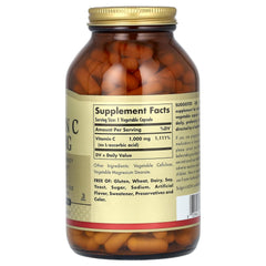 Solgar Vitamin C 1000 mg capsules in hand for convenient daily intake.