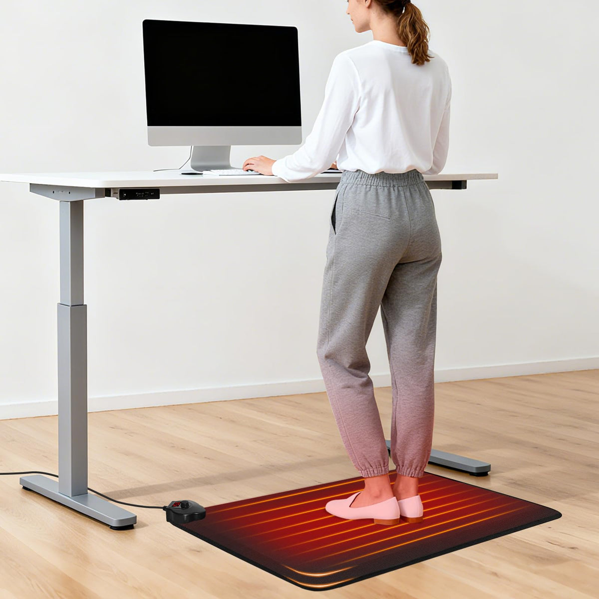 SoliSnug heated floor mat under desk providing targeted warmth for chilly workdays