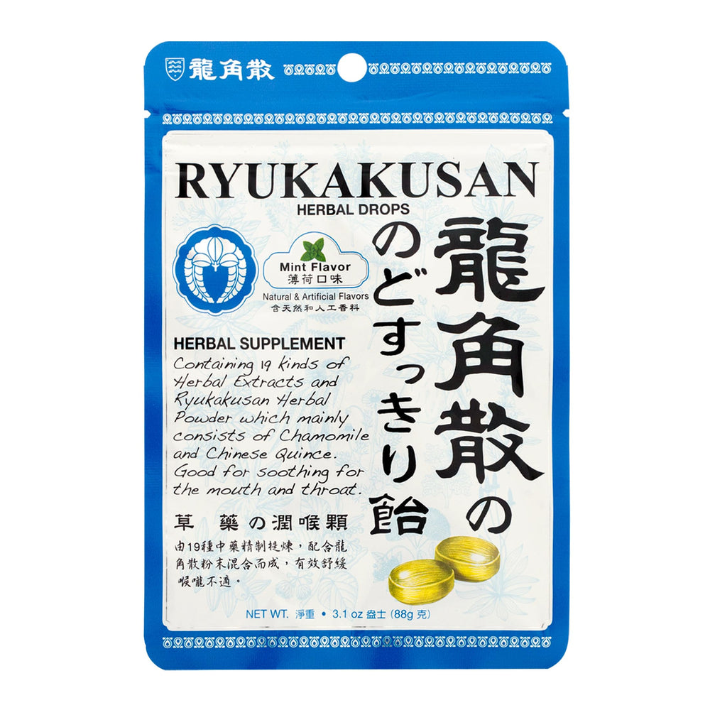 Packaging with Ryukakusan branding and mint drops on a table