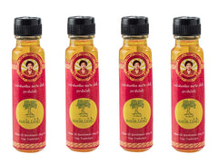 Somthawin Angki yellow oil bottle closeup for fast-warming Muay Thai prep