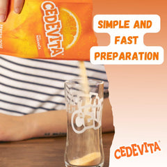 SORINA Cedevita glass with bright citrus-infused drink after mixing.