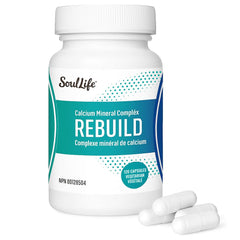 SoulLife Rebuild calcium mineral bottle on counter for daily bone support.