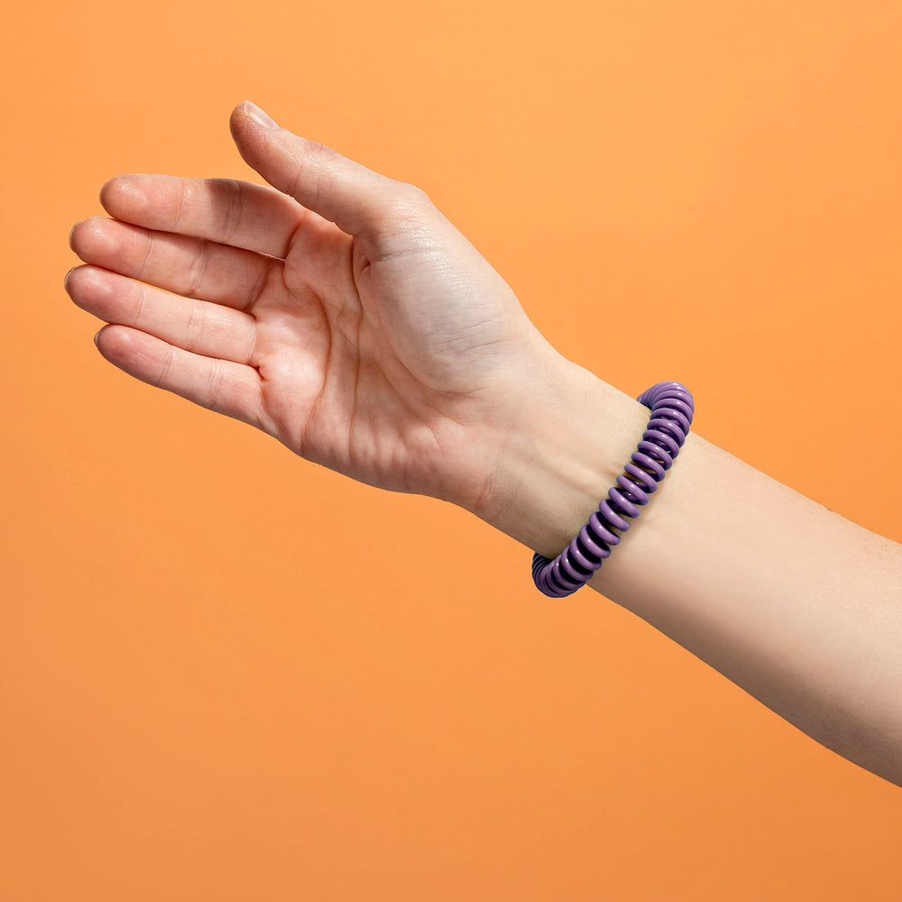 SOULSATION bracelet close-up in resealable pouch, designed for easy on-the-go storage.