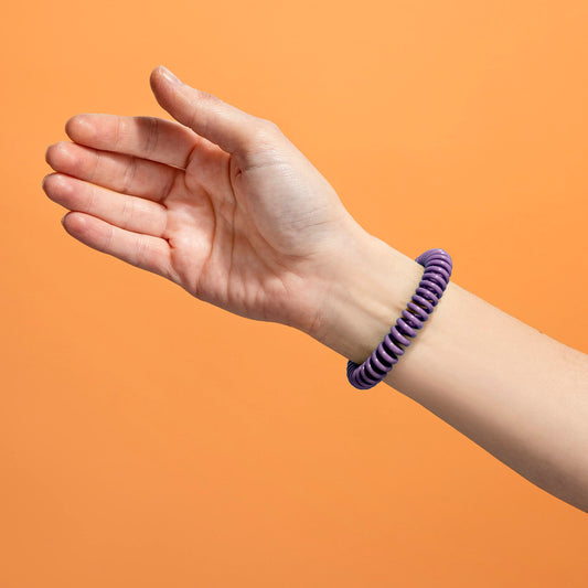 SOULSATION bracelet close-up in resealable pouch, designed for easy on-the-go storage.