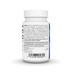 Source Naturals Melatonin lozenges on nightstand beside glass of water
