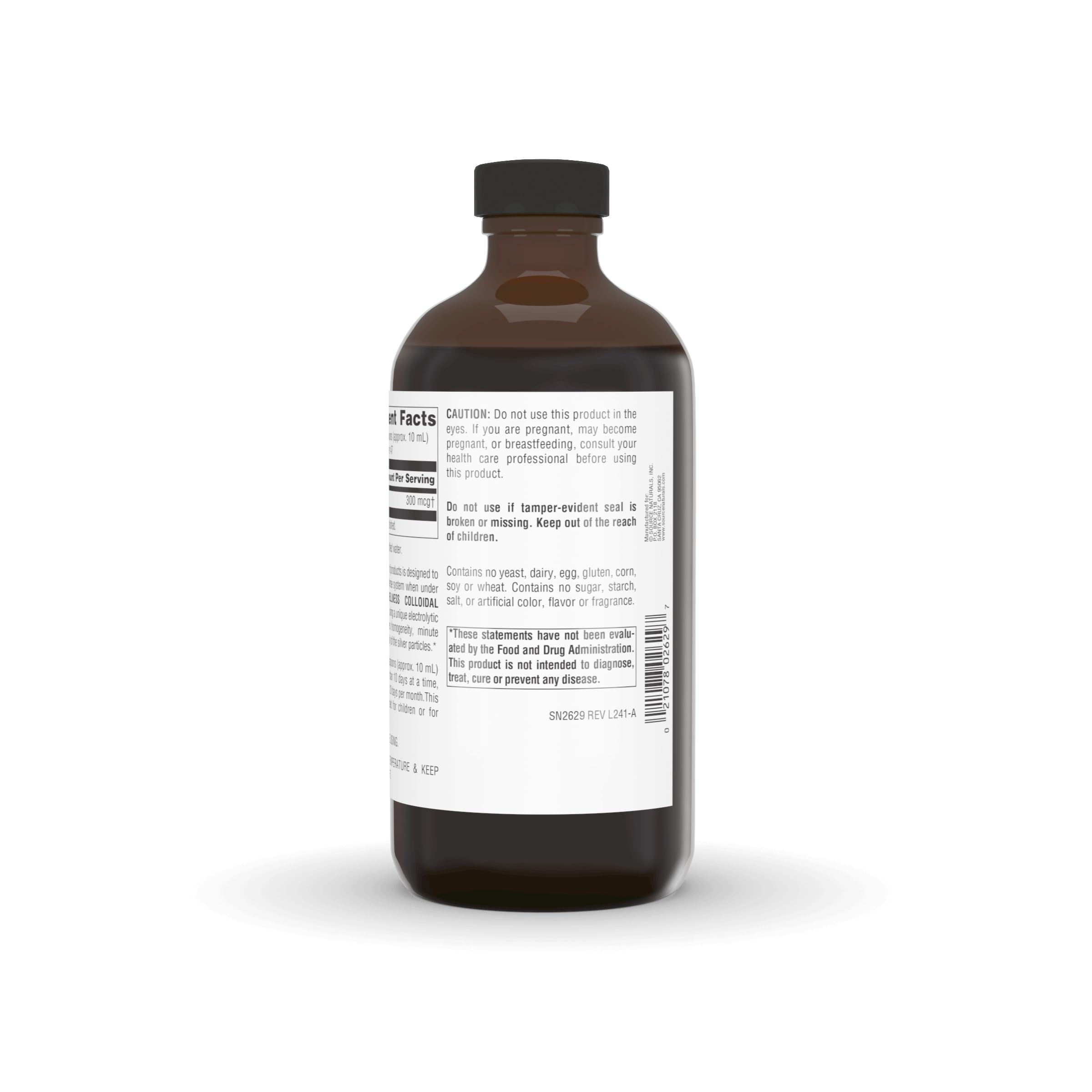 Measuring dosage with a spoon beside the Source Naturals bottle