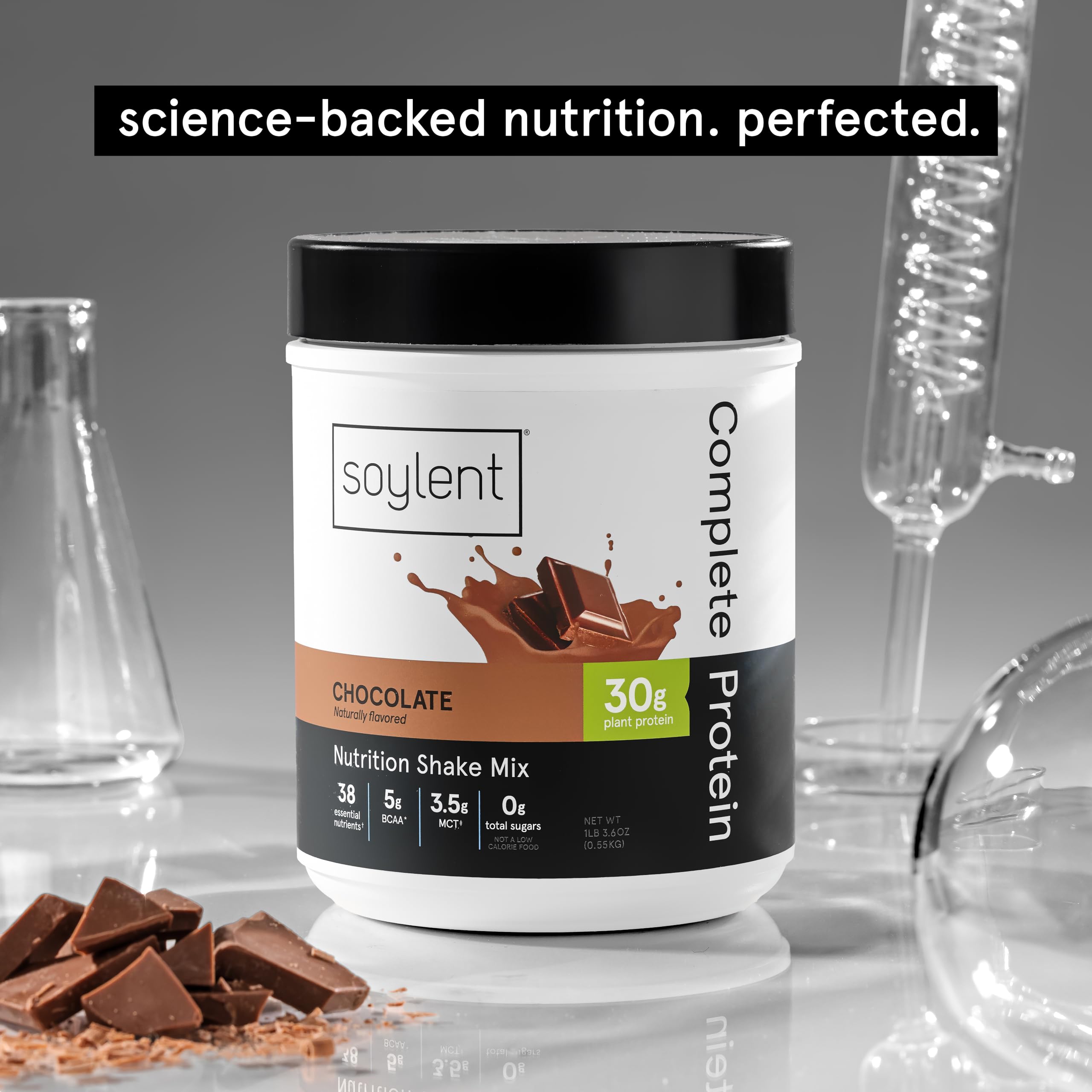 Scoop of Soylent Complete Protein Chocolate powder in hand for quick boost.