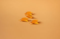 Spoonful Salmon Squeeze softgels ready for daily omega-3 supplementation.