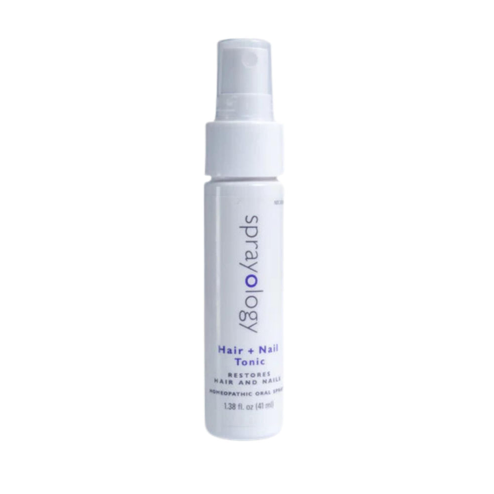 Sprayology Hair + Nail Tonic bottle close-up highlighting natural ingredients for healthy hair and nails