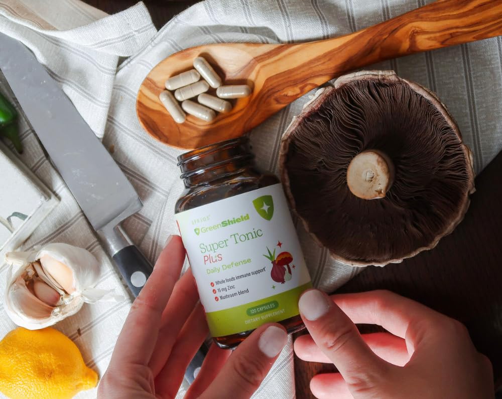 Close-up of SPRIGS Super Tonic Plus capsules ready to take with meals