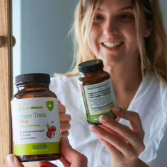SPRIGS Super Tonic Plus ingredients panel featuring garlic, ginger, vinegar, and organic produce