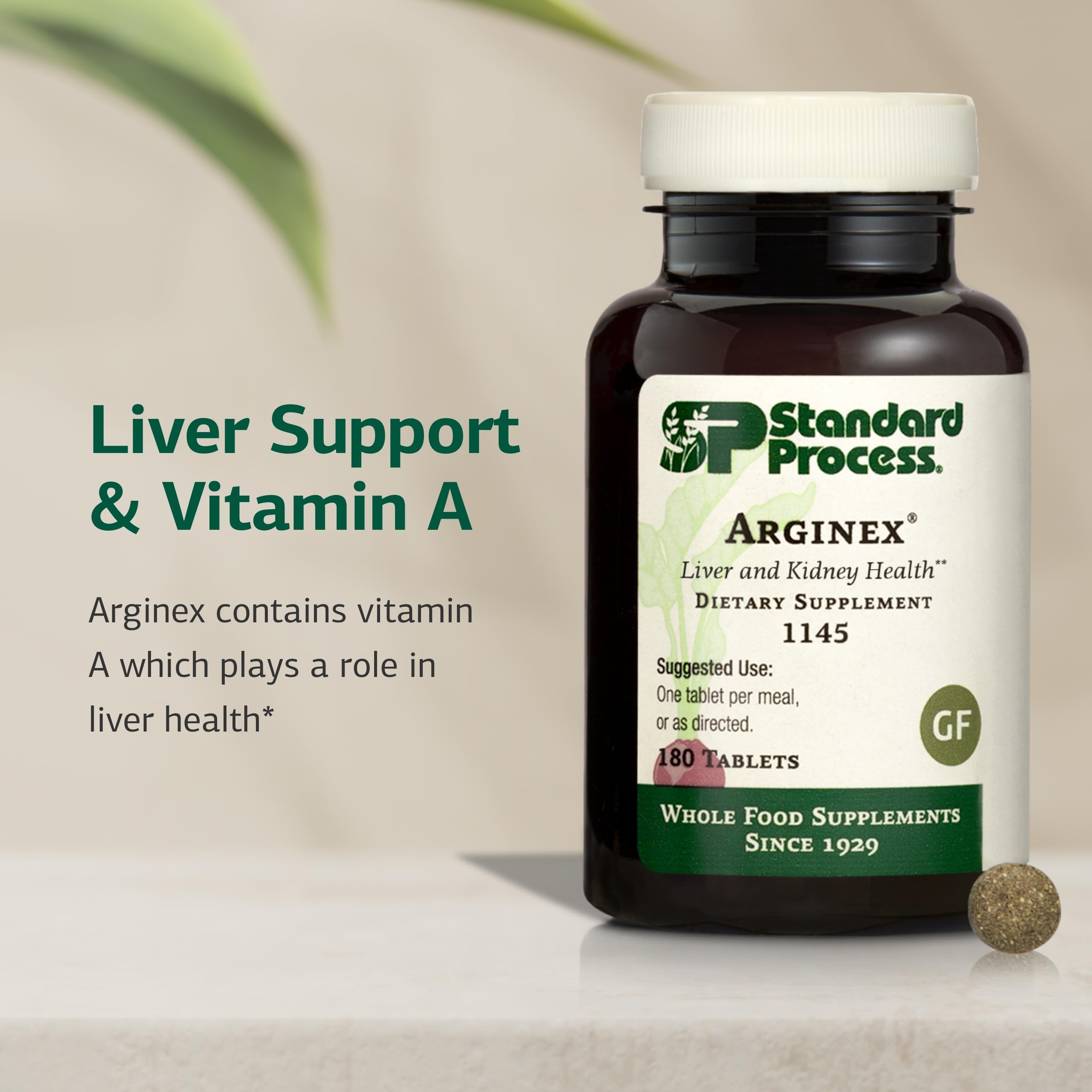 Standard Process Arginex tablets close-up shows 180-count supply.