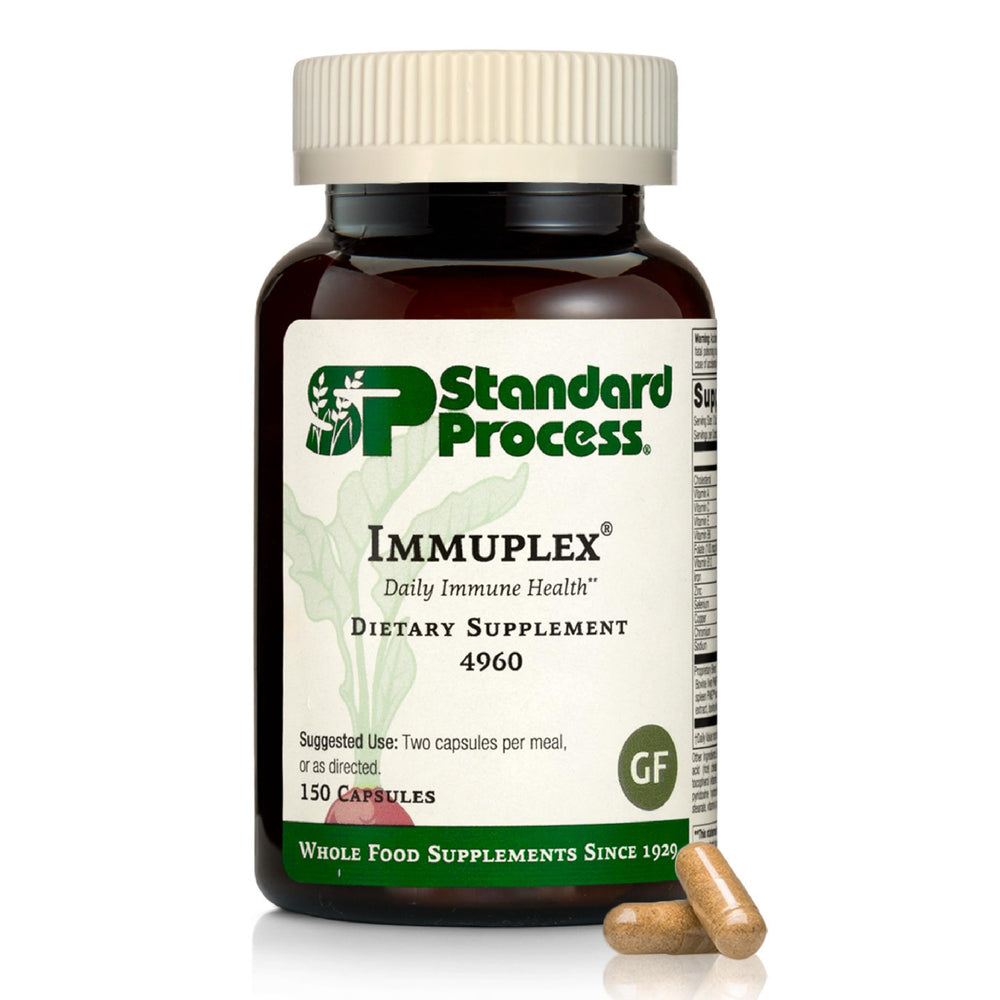 Standard Process Immuplex bottle with label showing daily immune support capsules