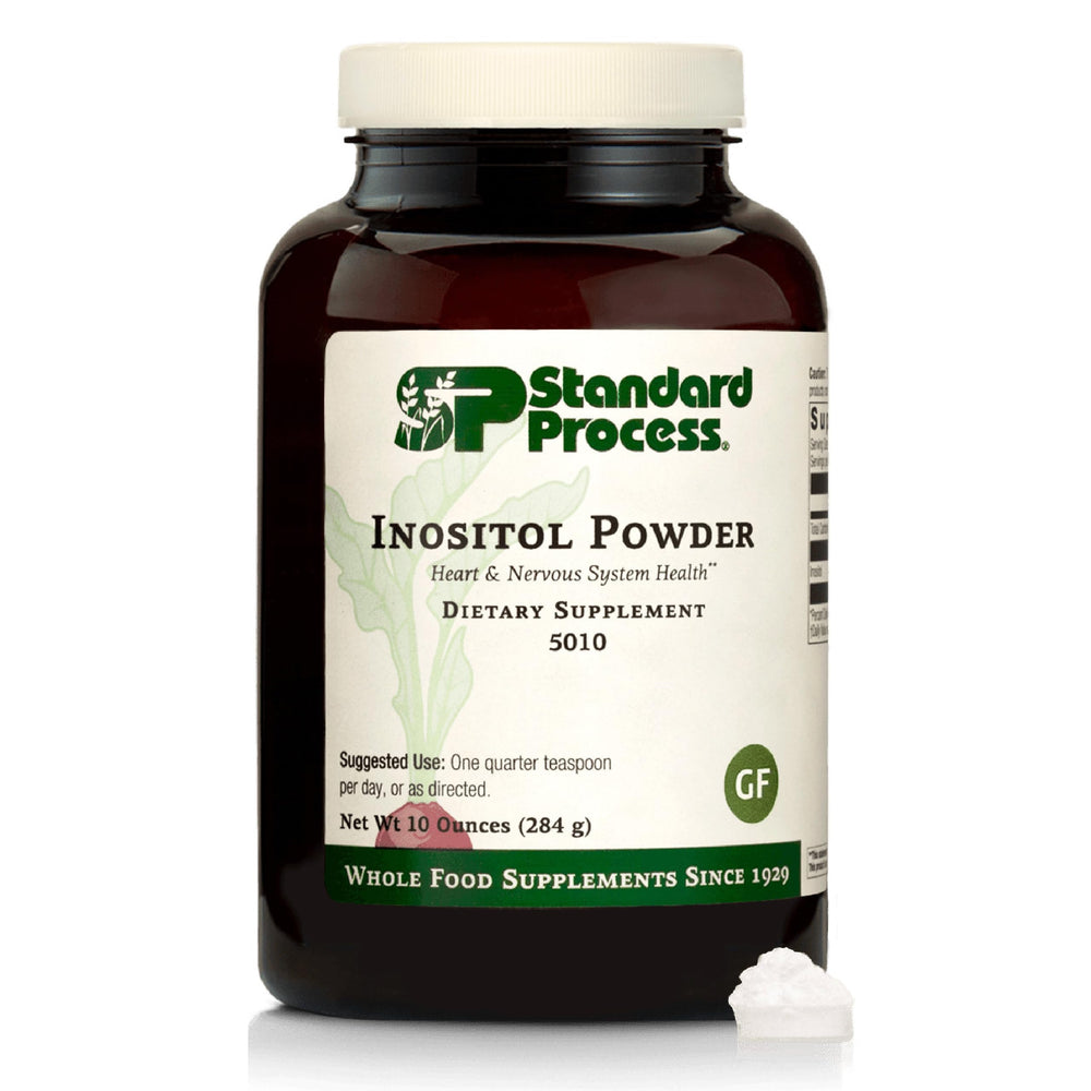 Standard Process Inositol Powder bottle on a kitchen counter for daily wellness.