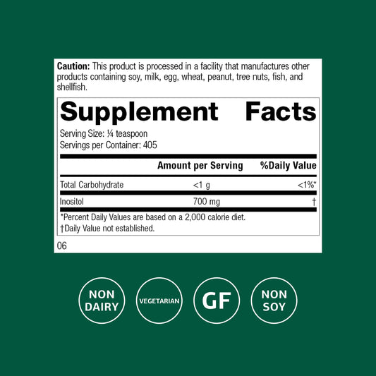 Standard Process Inositol Powder scoop pouring into a glass for easy shake use.