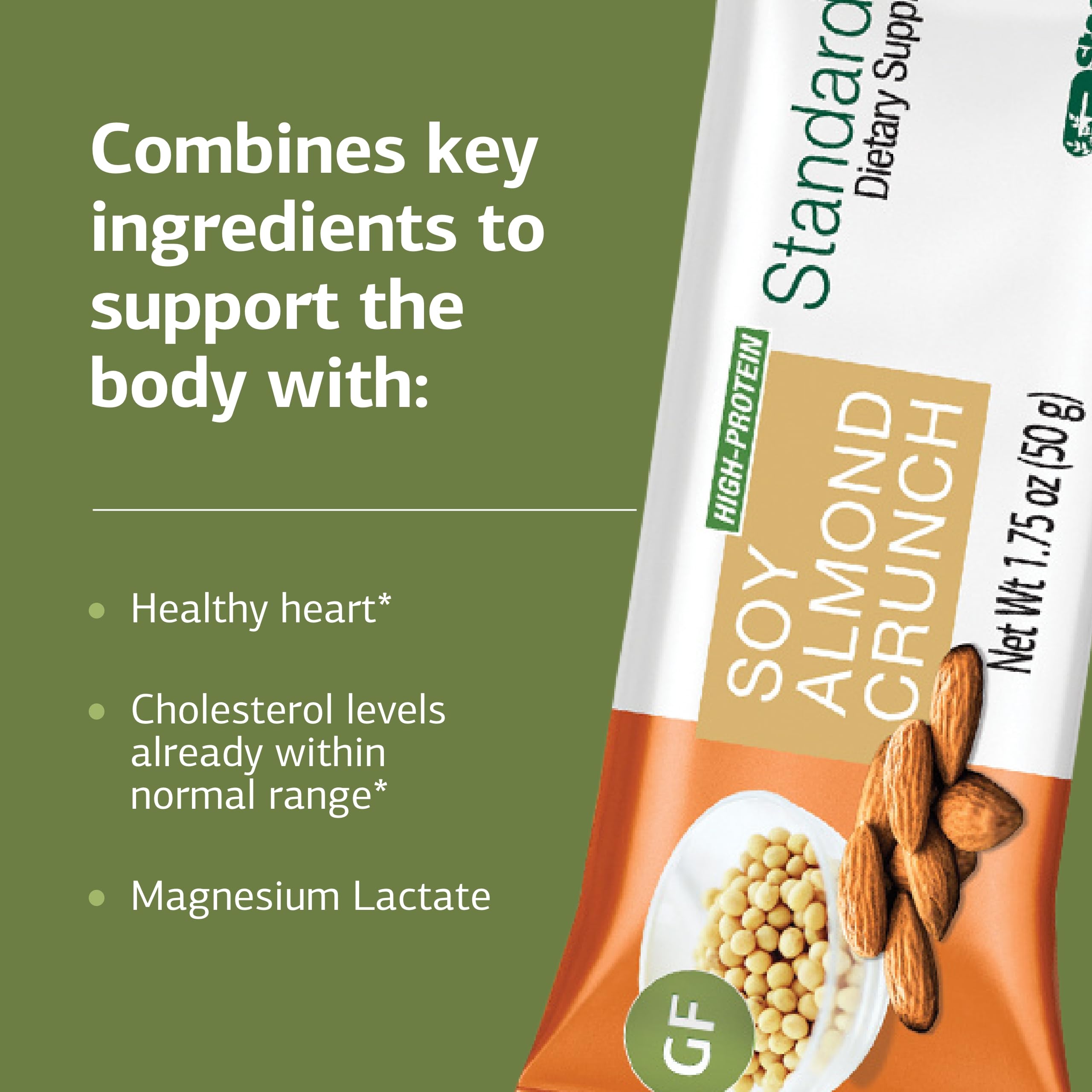 Standard Process StandardBar Soy Almond Crunch in hand, ideal for a quick on-the-go snack.