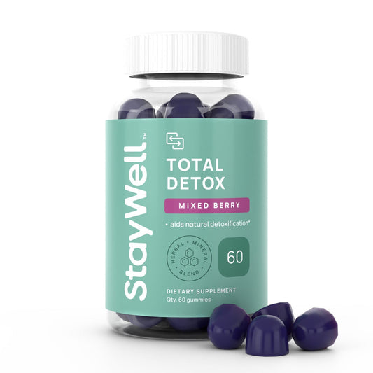 Stay-Well Naturals Total Detox bottle pour showing berry gummies for convenient support
