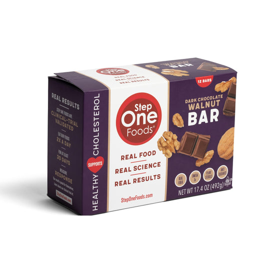 Step One Dark Chocolate Walnut Bar packaging in a 12-pack display, heart-friendly snack.