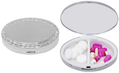 Stephanie Imports oval pill box front view, durable chrome-plated steel for daily medication.