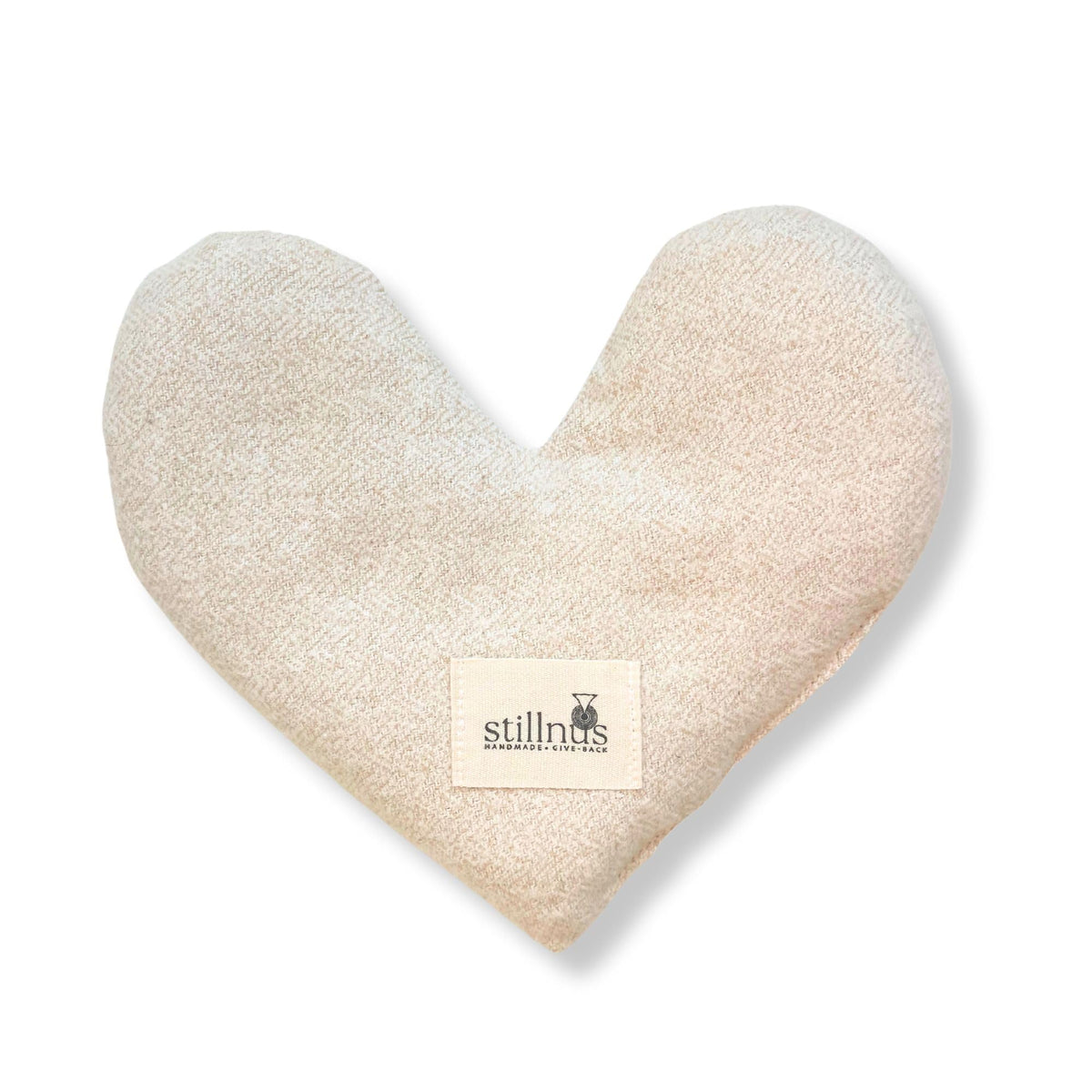Stillnus weighted heart eye pillow with lavender detail for calming relaxation.