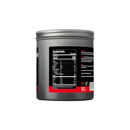 Strength Genesis Pur Zealander whey chocolate scoop beside tub