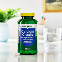 Front view of the calcium citrate bottle emphasizing purity and care