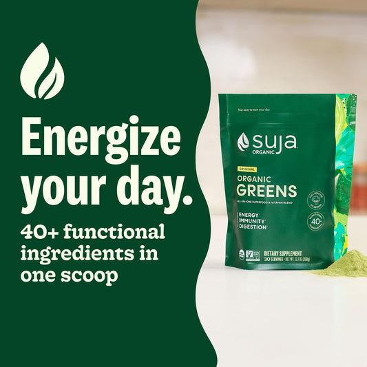 Suja Organic Greens powder scoop in cup ready to mix for nutrition.