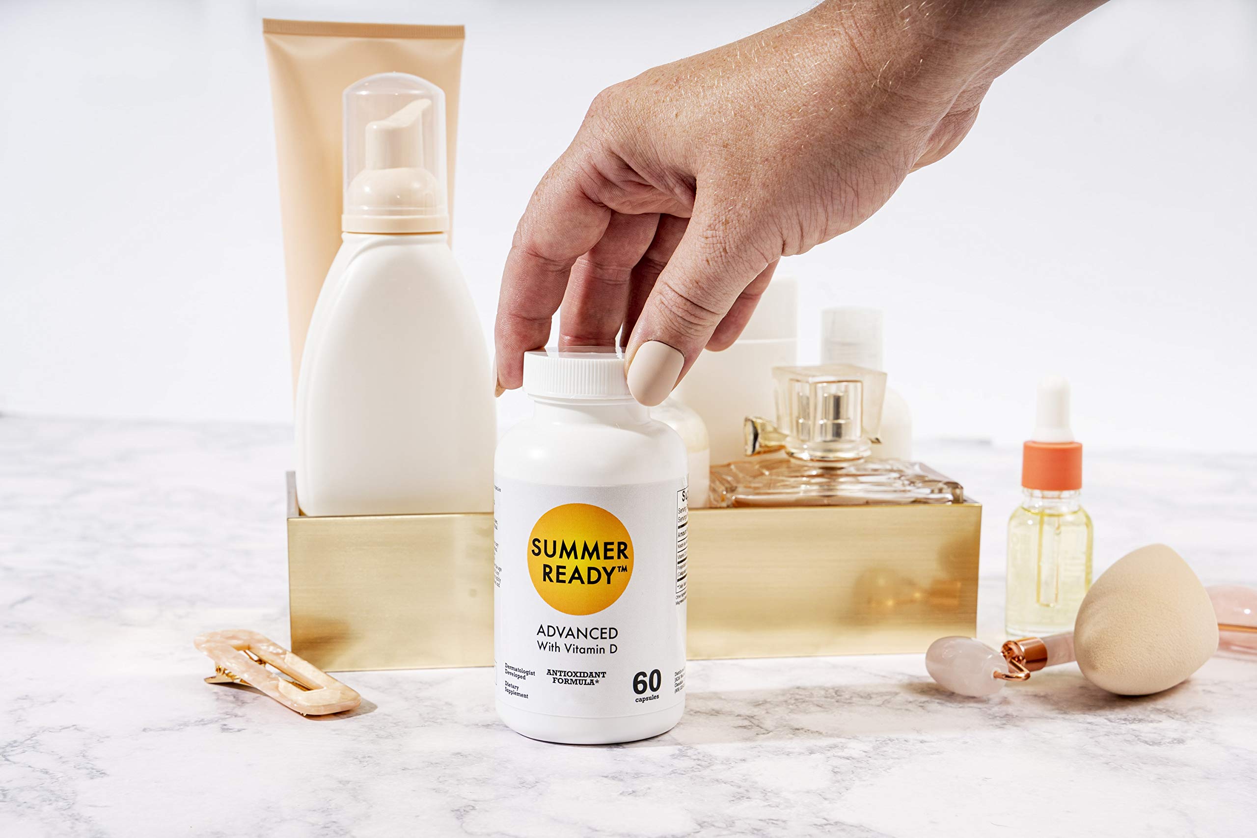 Summer Ready capsules in hand show convenient daily capsule routine