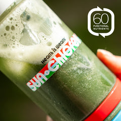 Bright green Sun Chlorella powder close-up showing texture.