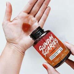 Sunday Scaries gummies poured from bottle for daily use