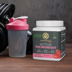 Sunwarrior Active Pre Workout ready-to-mix powder in a shaker.
