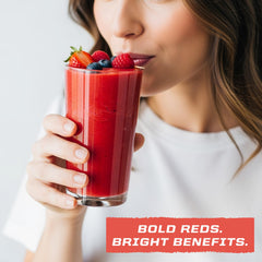 Sunwarrior Super Reds glass of prepared drink showing vibrant color