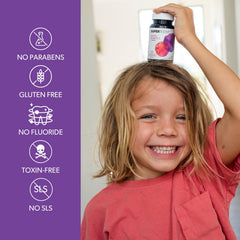 Strawberry flavor tablets beside fruit highlighting post-brush option
