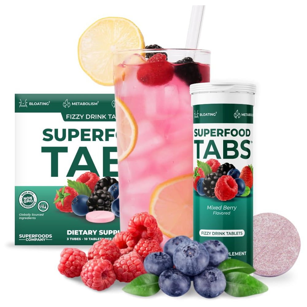 Superfood Tabs morning routine scene with glass of water suggests easy daily habit.