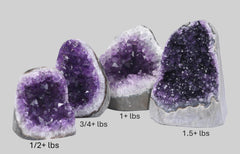 Superior amethyst rock cluster with polished edge for elegant shelf display.