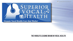 Recording studio setup with Superior Vocal Health Throat Saver on the desk.