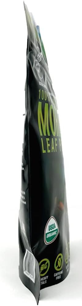 Spoon with SUPREME HERBALS Moringa powder for easy daily serving
