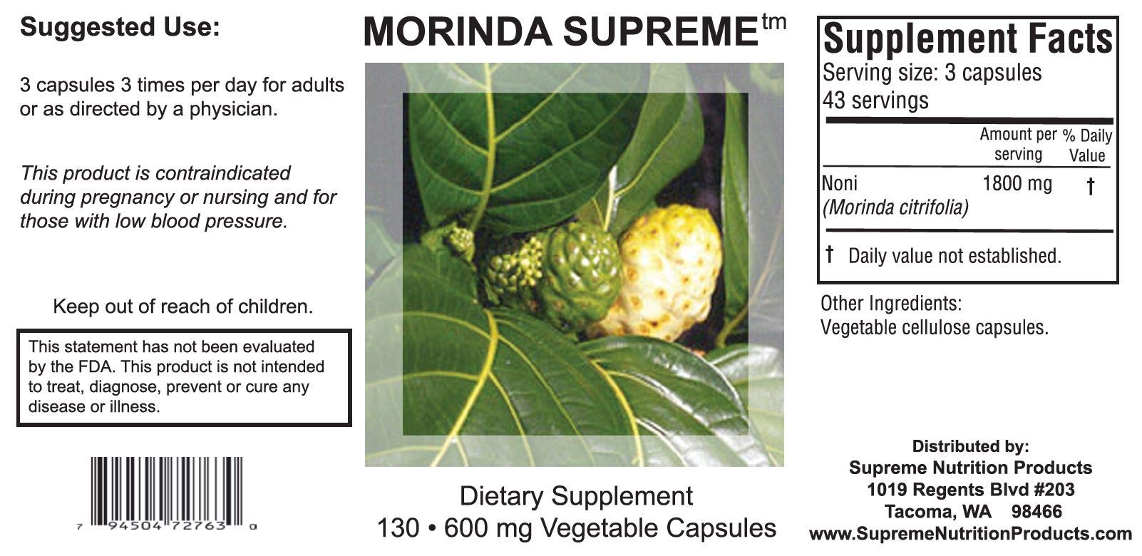 Morinda Supreme capsules being poured, illustrating easy daily use