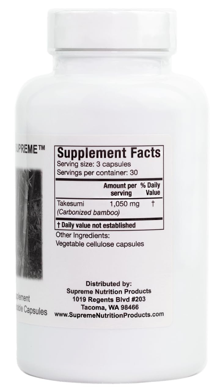 Close-up of Takesumi Supreme capsules highlighting 100% pure bamboo charcoal formula.