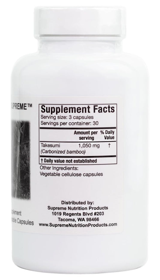 Close-up of Takesumi Supreme capsules highlighting 100% pure bamboo charcoal formula.