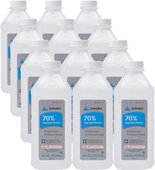 Swan 70% isopropyl rubbing alcohol bottle pour for quick surface cleaning.