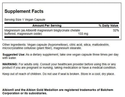 Swanson Albion Magnesium Glycinate capsules close-up, chelated for better absorption.
